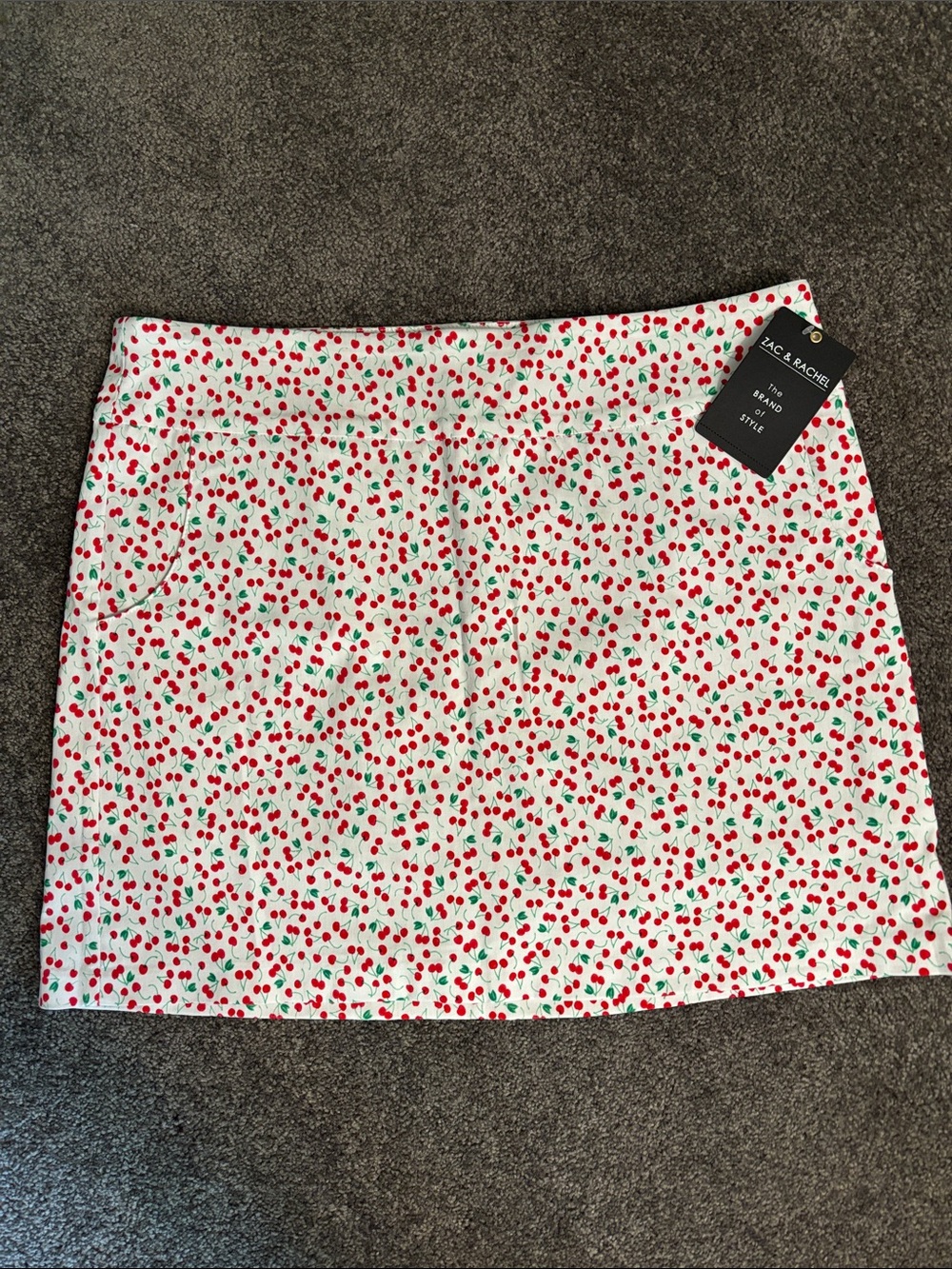 Zac & Rachel White skort with Red Cherry Print and Green Accents. Size 14 NWT.